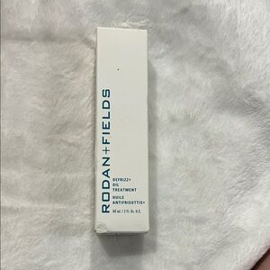 Rodan + Fields Defrizz+ Oil Treatment in White Packaging